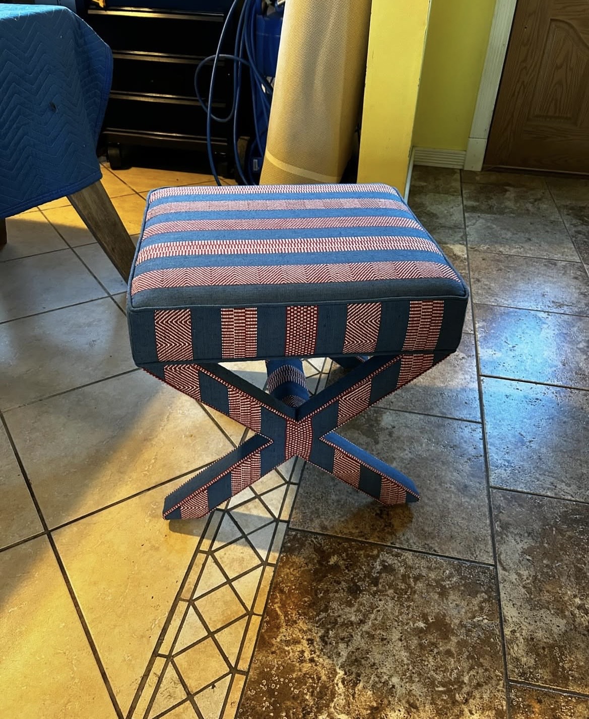 Finished X-frame stool — ikat stripe upholstery