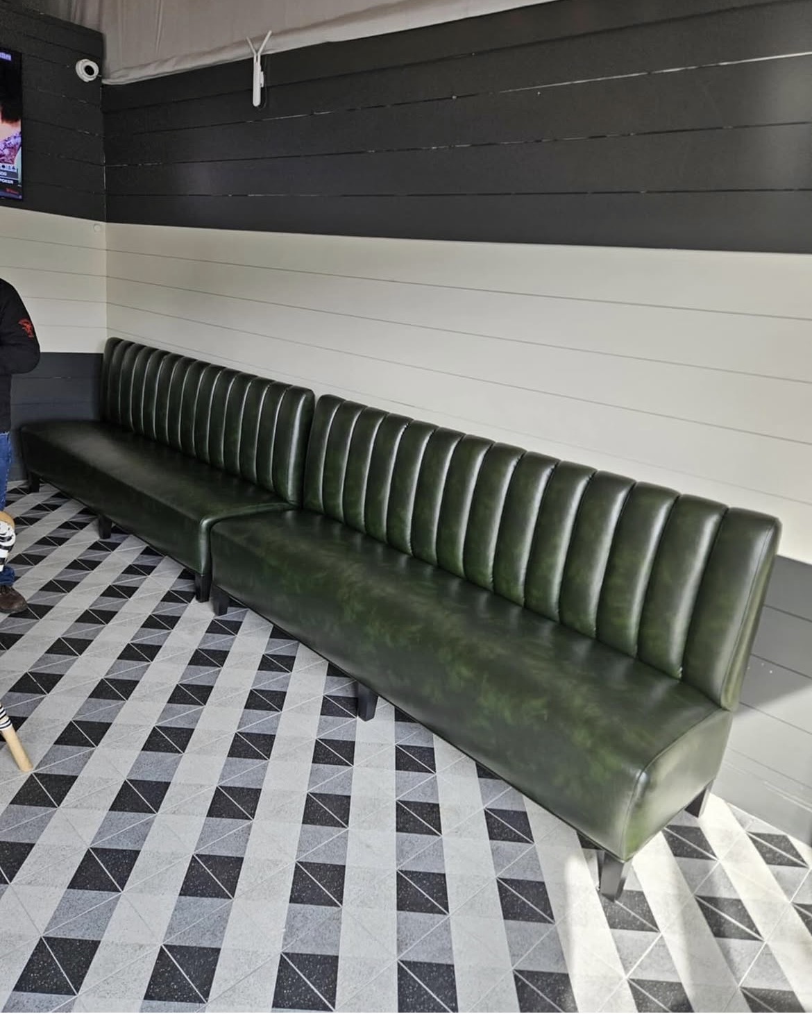 Finished green vinyl restaurant booth seating — commercial upholstery installation by Fabricio's Upholstery Shop, Suffolk County Long Island