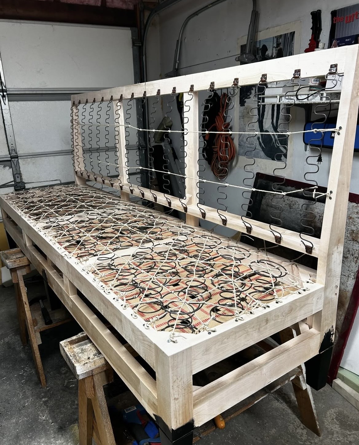 Restaurant banquette frame construction — custom hardwood frame and spring system built in Fabricio's Upholstery workshop, Bellport NY