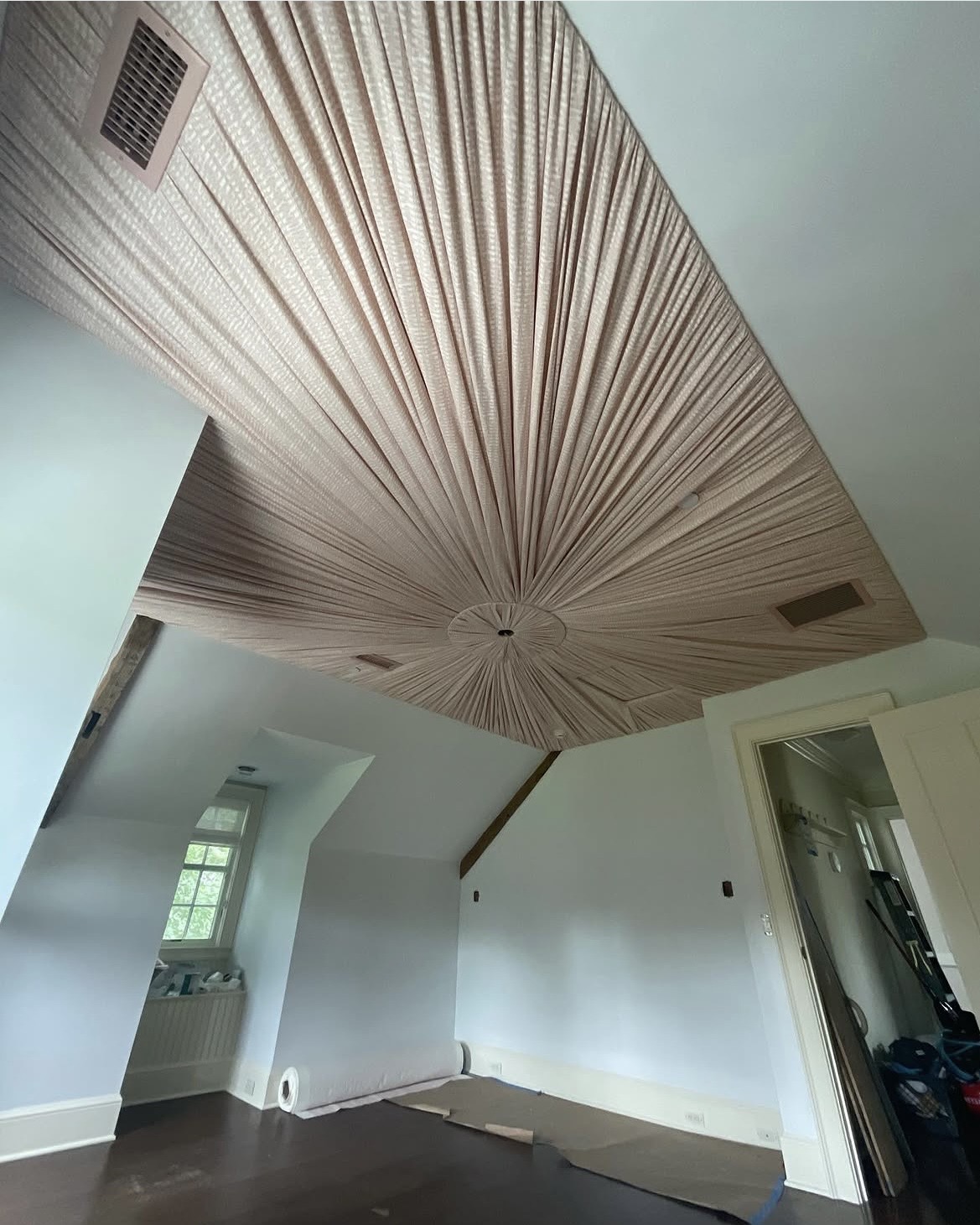 Fabric ceiling — second angle showing the radial pattern and room scale